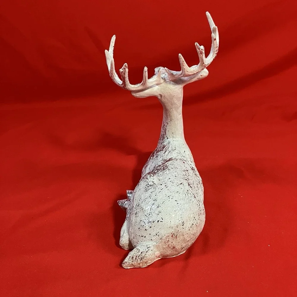 December Home reindeer laying